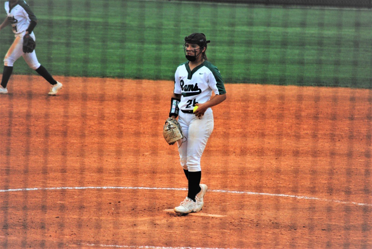 Alyssa Gonzalez prepares to pitch during a game between Mayde Creek and Seven Lakes.